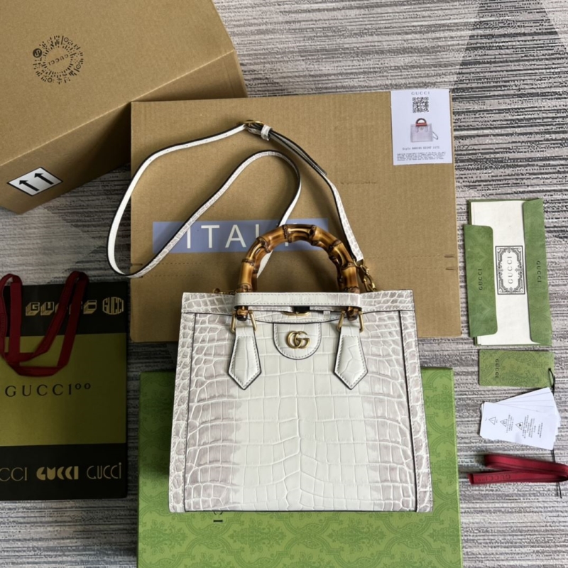 G*u*i top handle bags
